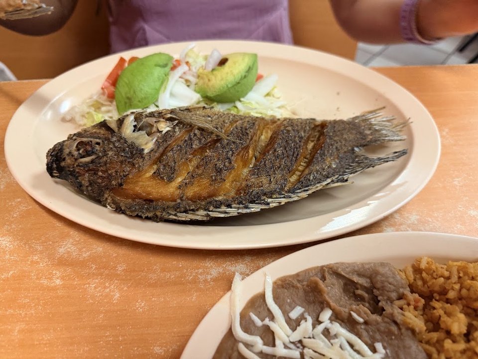 Whole Fried Tilapia with Avocado Slices
